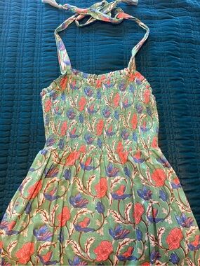 Woman’s green floral dress